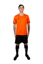 man wearing Training Kit  in Orange/Black